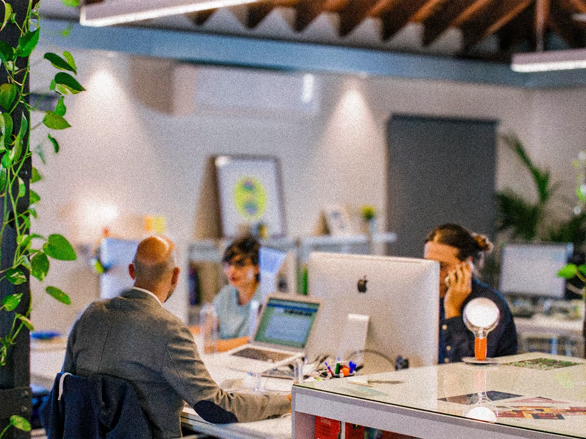 A creative office, 3 people at work.